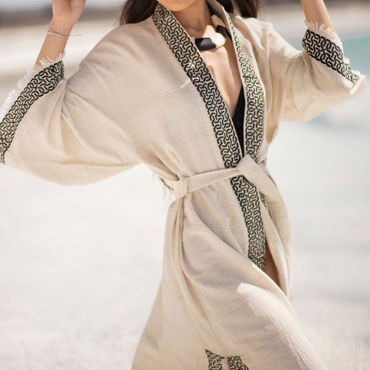 Unisex linen and hemp kimono robe with hand-block printed boho pattern, styled as beach cover-up 